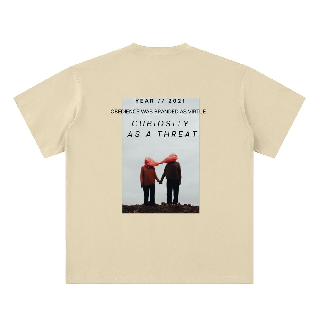 pandemic t-shirt back view in apricot featuring Year 2021 graphic with obedience and curiosity text