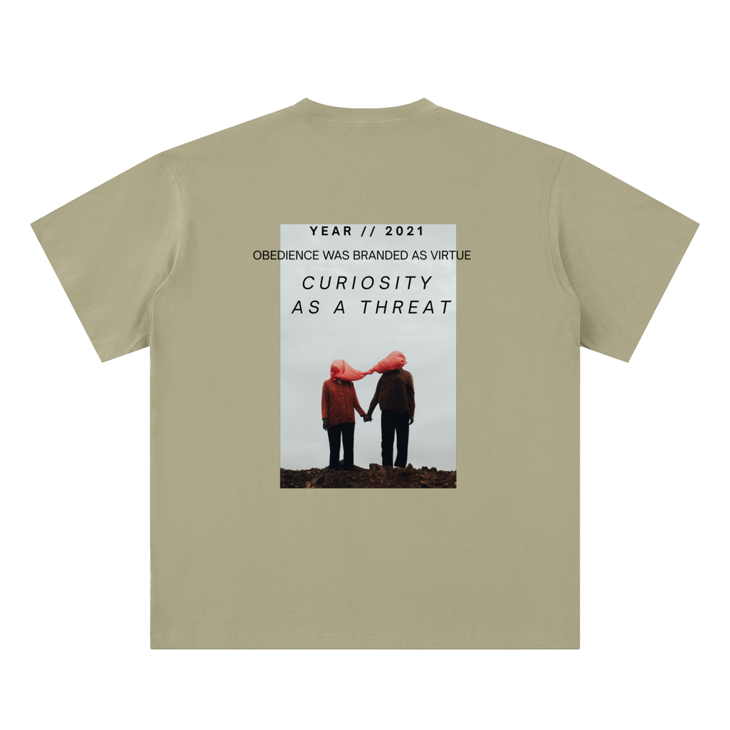 pandemic t-shirt back view in gray coffee featuring Year 2021 graphic with obedience and curiosity text