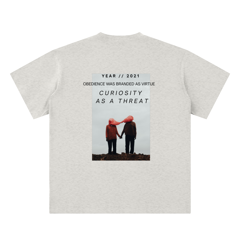 pandemic t-shirt back view in oat gray featuring Year 2021 graphic with obedience and curiosity text